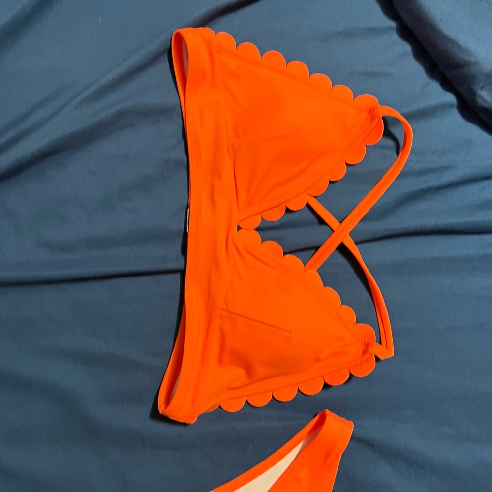 New with tags size large bikini. Bottoms fit like a medium